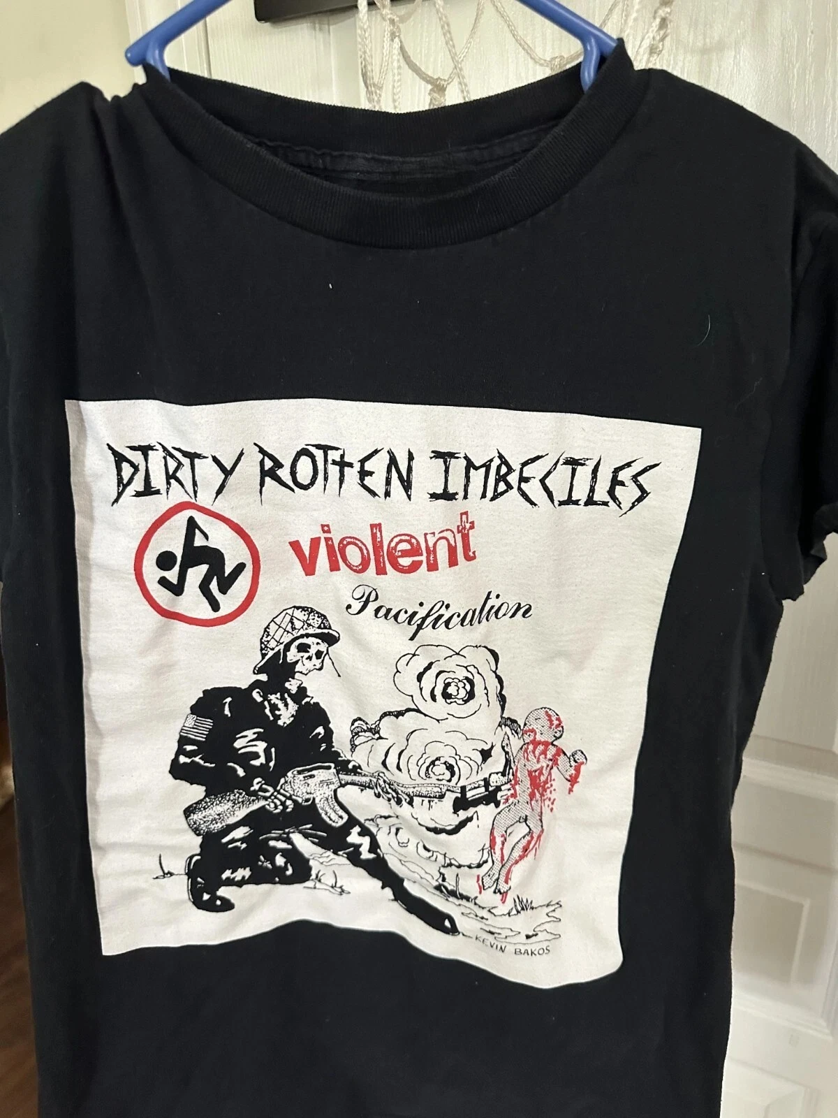 Vintage Dirty Rotten Imbeciles D R I Violent Pacification Shirt American Hip-hop Rock T-shirt Men Street Short-sleeved Women Top
Vintage Dirty Rotten Imbeciles D R I Violent Pacification Shirt American Hip-hop Rock T-shirt Men Street Short-sleeved Women Top