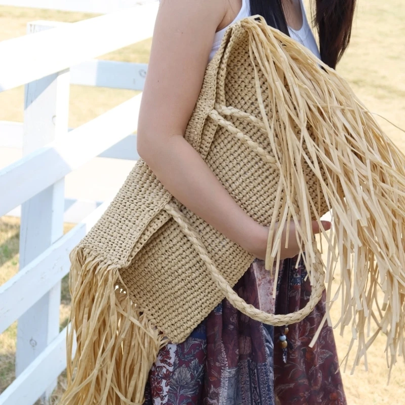 Новая женская сумка-тоут из соломы Lafite с бахромой ручной работы, большая пляжная сумка для летнего отдыха, сумка-шоппер с кисточками
Новая женская сумка-тоут из соломы Lafite с бахромой ручной работы, большая пляжная сумка для летнего отдыха, сумка-шоппер с кисточками