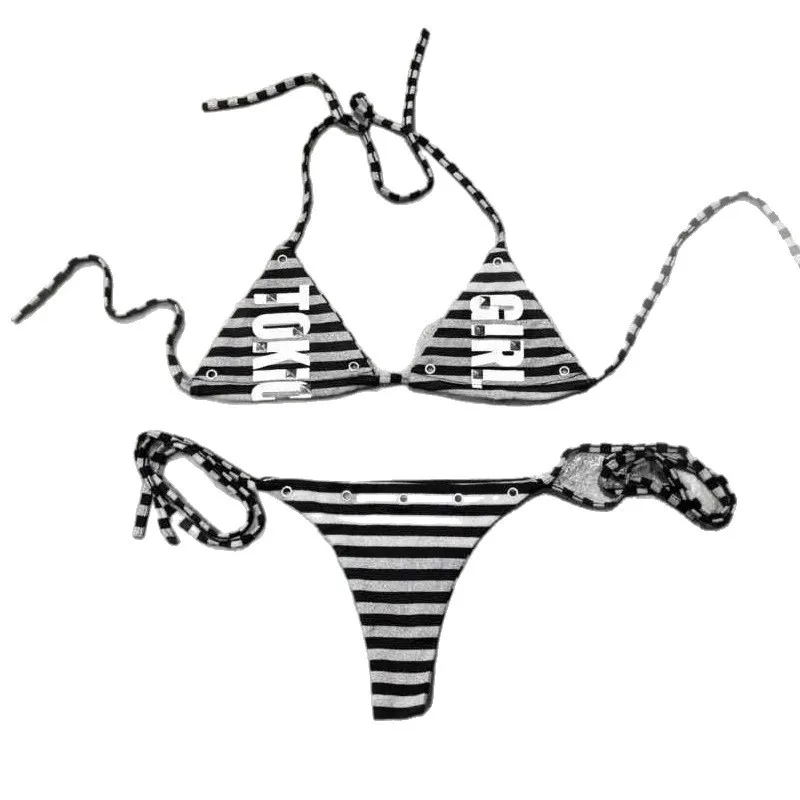 Dark punk style lace up spicy girl set, European and American ins beach style sexy printed split bikini women's clothing
Dark punk style lace up spicy girl set, European and American ins beach style sexy printed split bikini women's clothing