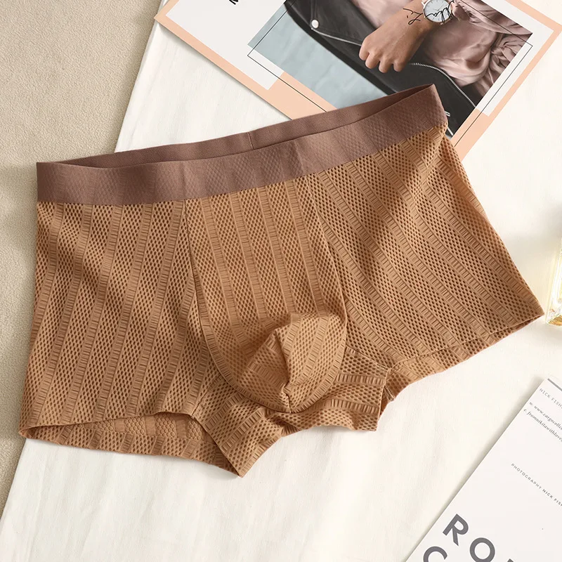 Mesh ice silk men's underwear comfortable breathable seamless boxer briefs summer jacquard boys simple solid color lingerie
Mesh ice silk men's underwear comfortable breathable seamless boxer briefs summer jacquard boys simple solid color lingerie