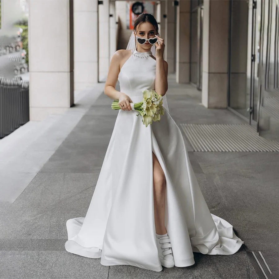 Customized Halter Neck Sleeveless Front slit Wedding Dresses Backless Zipper Party Dresses For Special Occasions
Customized Halter Neck Sleeveless Front slit Wedding Dresses Backless Zipper Party Dresses For Special Occasions