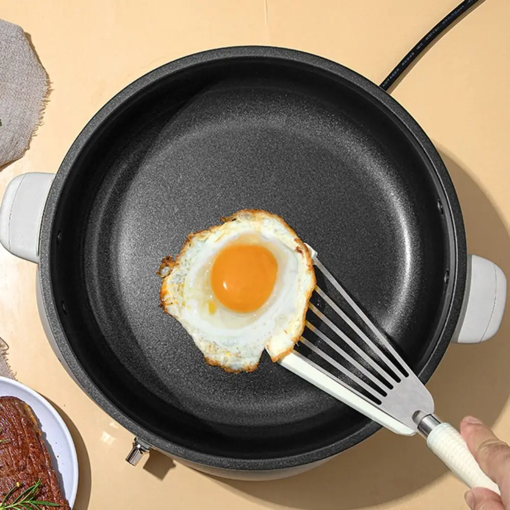 Silicone Handle Fish Frying Spatula Heat Resistant Hollow Nonstick Spatula No Damage To Pot Fried Egg Scoop For Egg Fish
Silicone Handle Fish Frying Spatula Heat Resistant Hollow Nonstick Spatula No Damage To Pot Fried Egg Scoop For Egg Fish