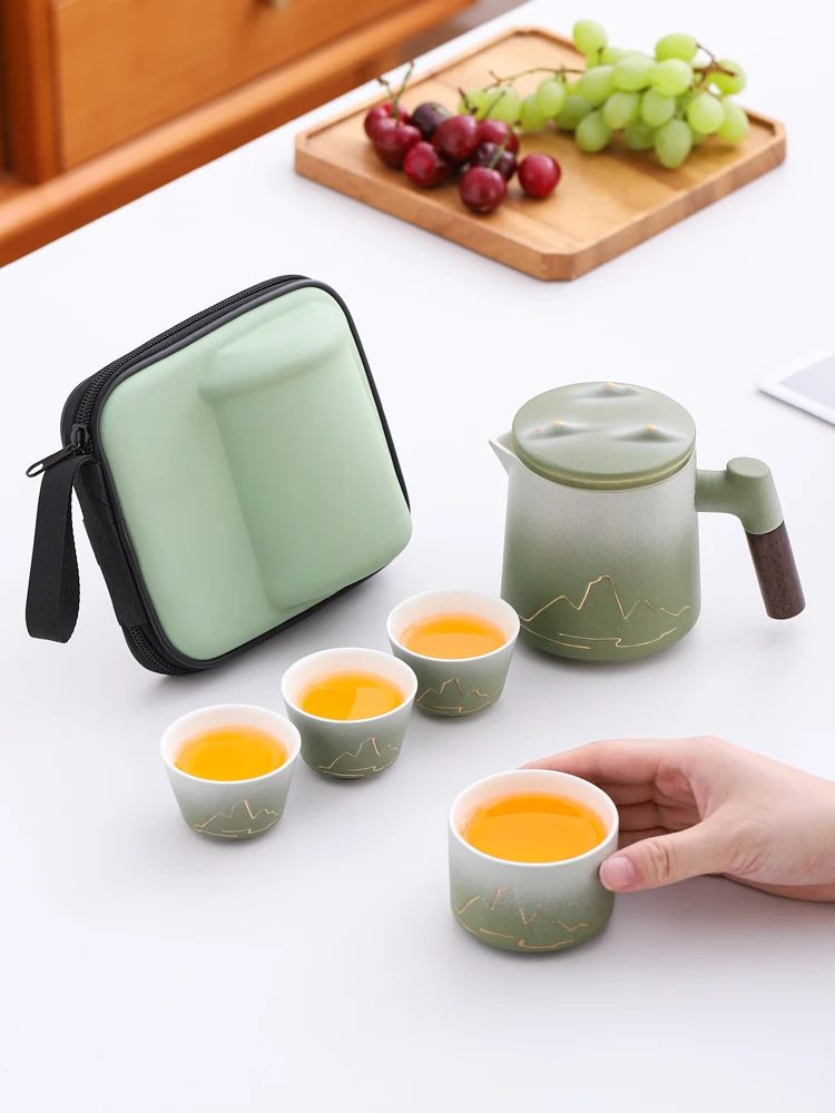 Portable Travel Ceramic Tea Set Gradient Design Tea Water Separation Cup Outdoor Quick Guest Brewing Pot Four Cups in a Set
Portable Travel Ceramic Tea Set Gradient Design Tea Water Separation Cup Outdoor Quick Guest Brewing Pot Four Cups in a Set