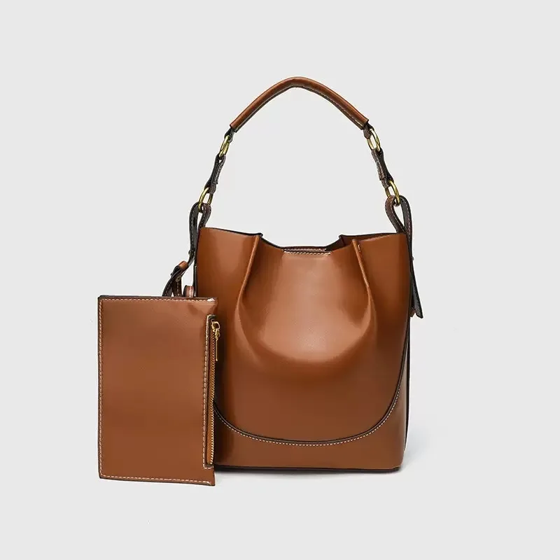 2025 new women's bag brown pleated drawstring versatile hand-held bucket bag wide shoulder strap diagonal cross bag 
2025 new women's bag brown pleated drawstring versatile hand-held bucket bag wide shoulder strap diagonal cross bag