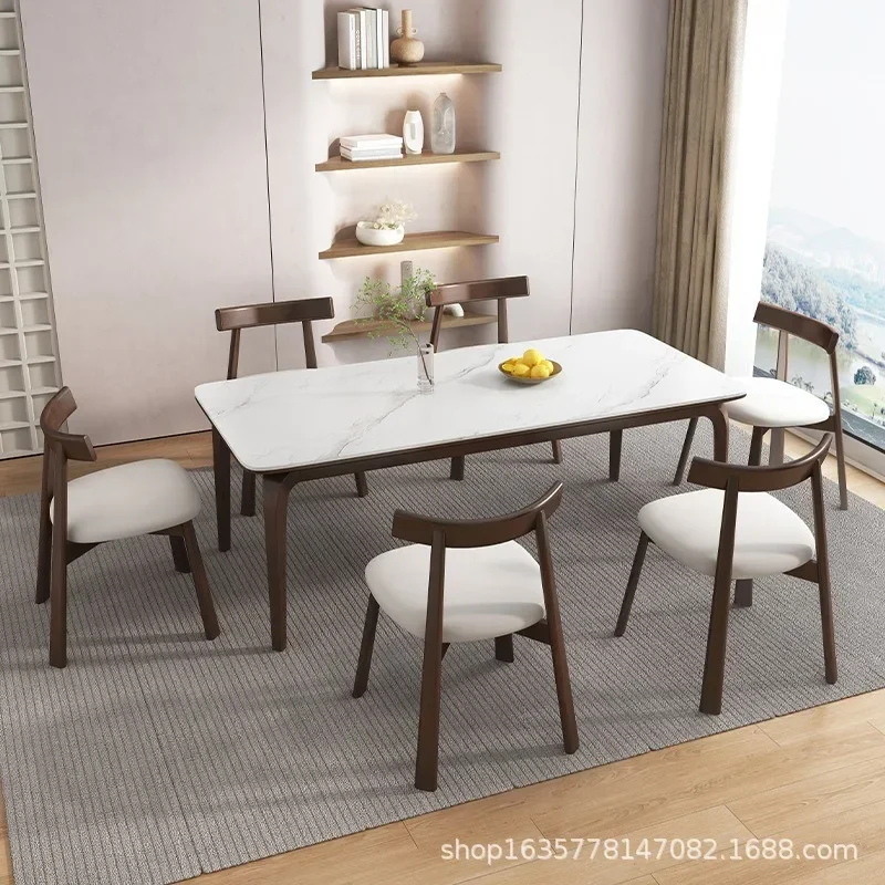 New solid wood home modern simple Nordic small apartment table walnut rectangular dining table and chair combination
New solid wood home modern simple Nordic small apartment table walnut rectangular dining table and chair combination