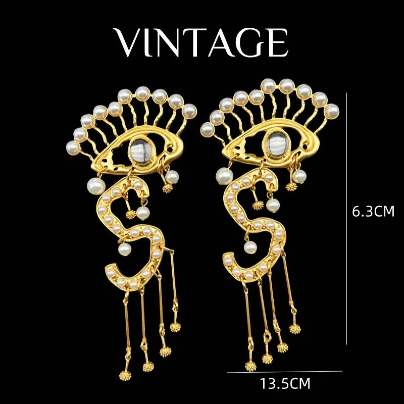 Retro exaggerated Demon Eyes Pearl Personality tassel earrings Medieval vintage jewelry
Retro exaggerated Demon Eyes Pearl Personality tassel earrings Medieval vintage jewelry