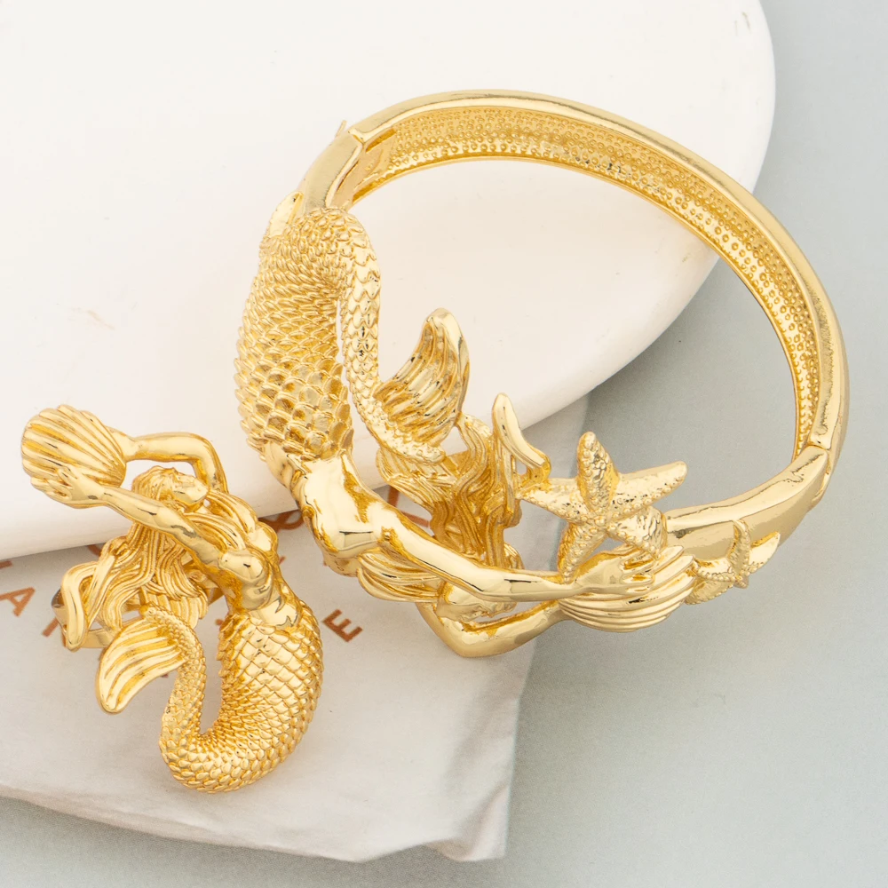 Trend Mermaid Bangle With Ring for Women Gold Color Jewelry Set Creative Design Cuff Bracelet Adjustable Ring for Girls Clothing
Trend Mermaid Bangle With Ring for Women Gold Color Jewelry Set Creative Design Cuff Bracelet Adjustable Ring for Girls Clothing