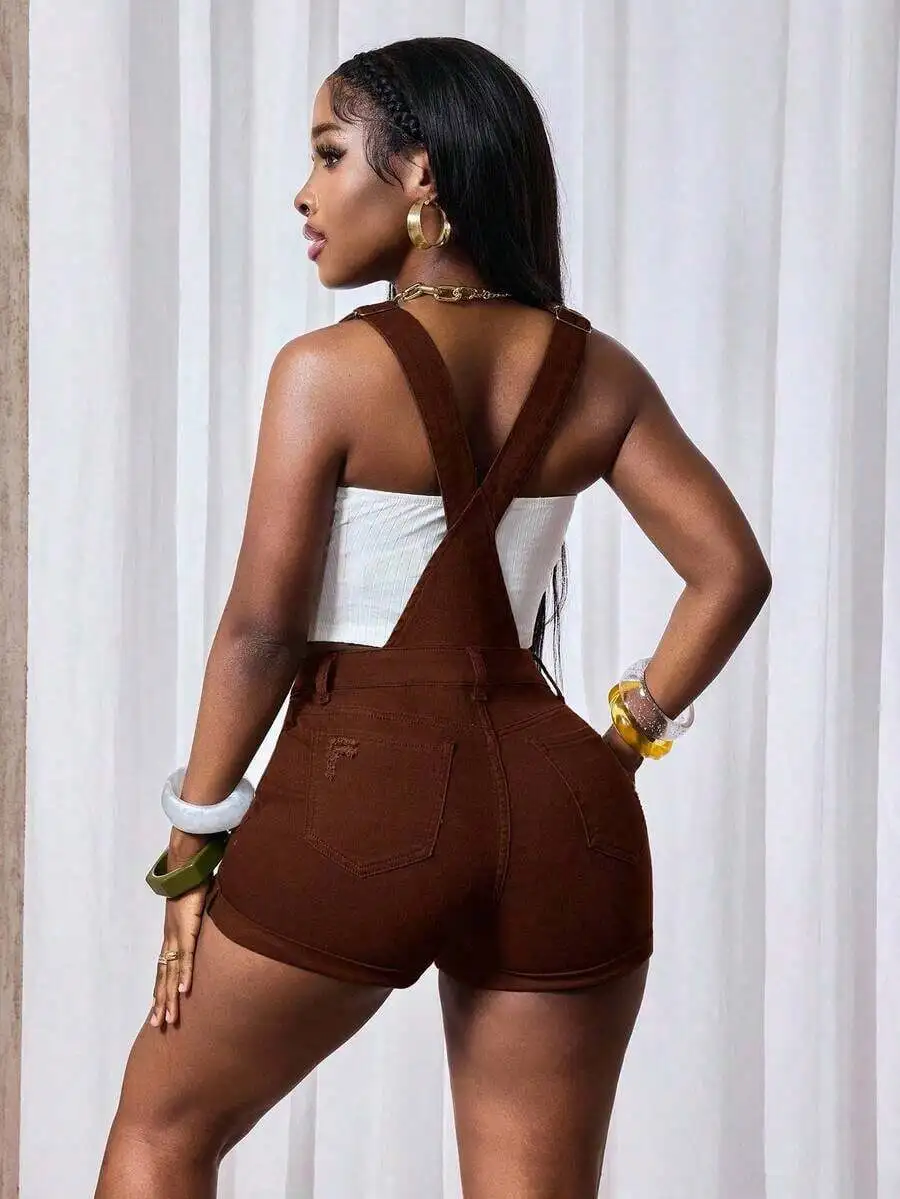 Brown Denim Overall Romper With Button Front And Pockets
Brown Denim Overall Romper With Button Front And Pockets