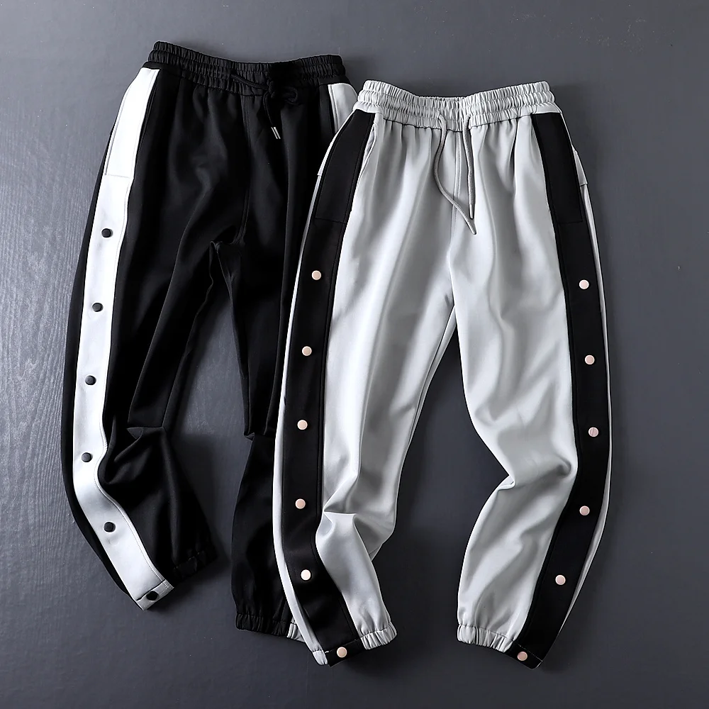 Модные мужские свободные повседневные спортивные штаны с разрезами, декоративные пуговицы, длинные прямые брюки со средней талией на весну
Модные мужские свободные повседневные спортивные штаны с разрезами, декоративные пуговицы, длинные прямые брюки со средней талией на весну