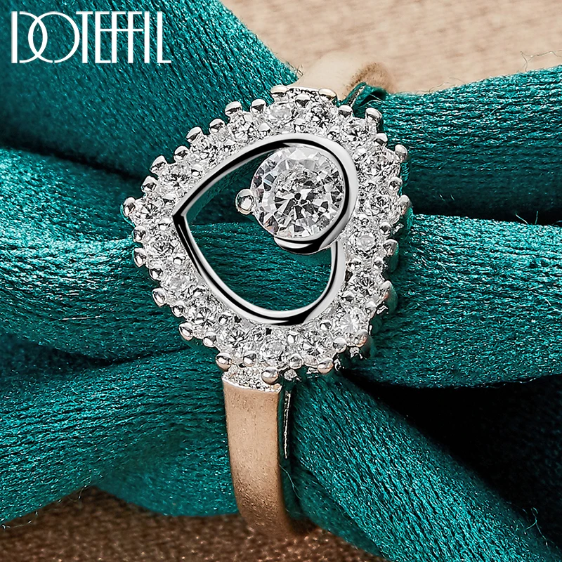 DOTEFFIL 925 Sterling Silver Heart Round Full AAA Zircon Ring For Women Man Wedding Engagement Party Fashion Charm Jewelry
DOTEFFIL 925 Sterling Silver Heart Round Full AAA Zircon Ring For Women Man Wedding Engagement Party Fashion Charm Jewelry