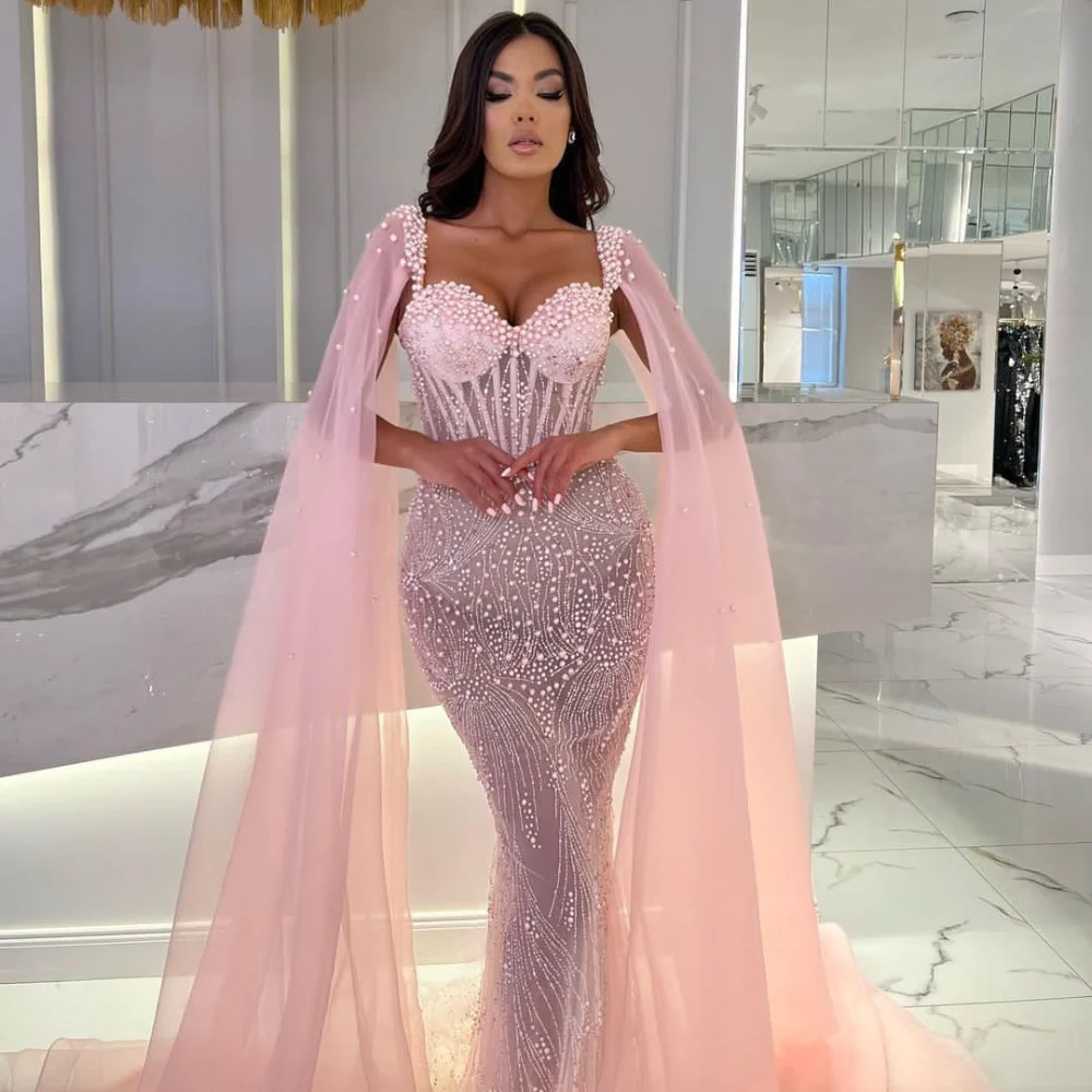 Pink Mermaid Evening Dresses Sleeveless V Neck Straps Capes Sequins Pearls Hollow Lace Prom Dresses Custom Made Gown
Pink Mermaid Evening Dresses Sleeveless V Neck Straps Capes Sequins Pearls Hollow Lace Prom Dresses Custom Made Gown