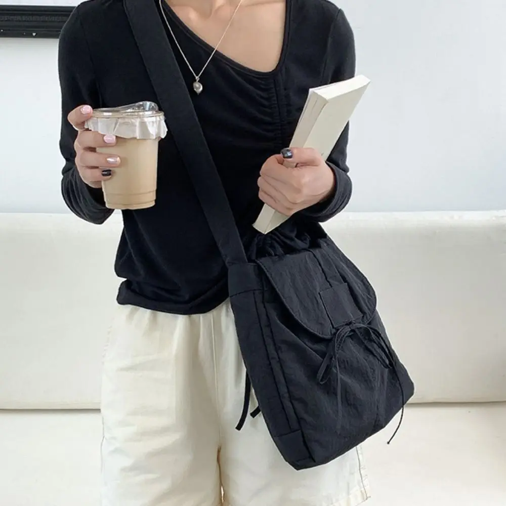 Korean Style Flap Nylon Bow Crossbody Bag Messenger Bag Niche Design Light Soft Nylon Bag Zipper Large Capacity Shoulder Bag
Korean Style Flap Nylon Bow Crossbody Bag Messenger Bag Niche Design Light Soft Nylon Bag Zipper Large Capacity Shoulder Bag