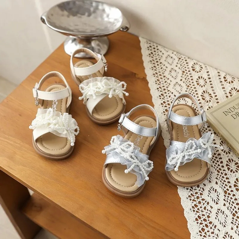 Children's sandals 2026 summer new style pearl bowknot girls' princess sandals soft sole versatile sandals
Children's sandals 2026 summer new style pearl bowknot girls' princess sandals soft sole versatile sandals