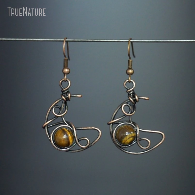 5Pcs Wholesale Vintage Boho Witch Handmade Wire Wrapped Crescent Moon Antique Silver Color Tiger Eye Stone Earring ER48528
5Pcs Wholesale Vintage Boho Witch Handmade Wire Wrapped Crescent Moon Antique Silver Color Tiger Eye Stone Earring ER48528