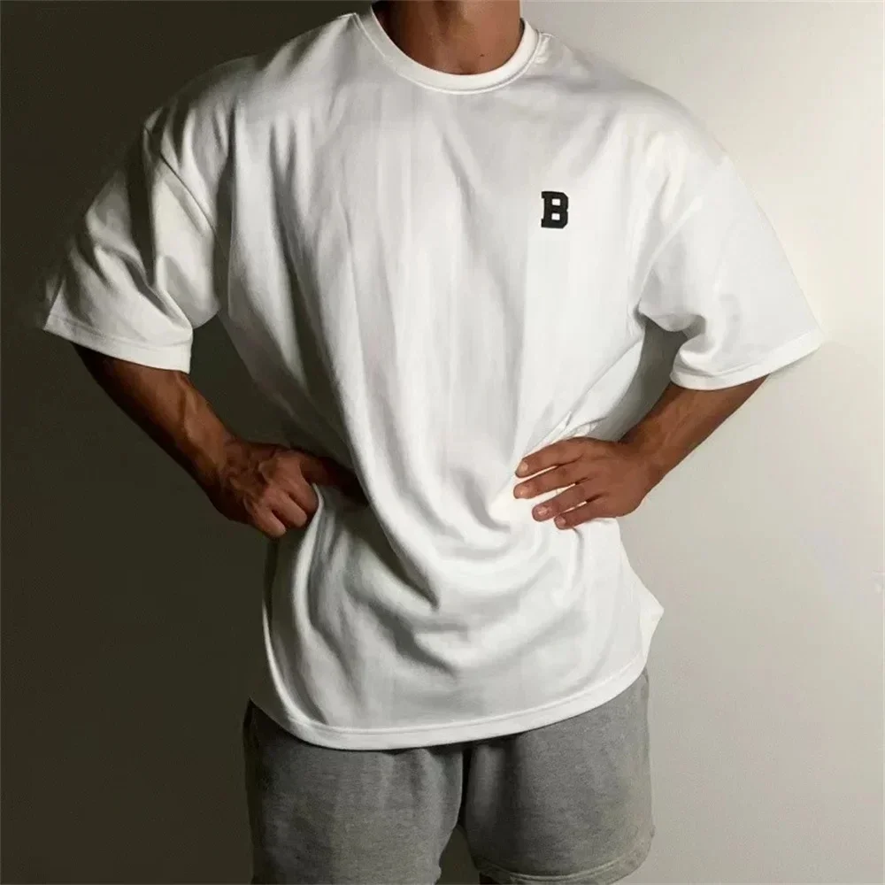 Nueva camiseta , camisetas informales de algodón de gran tamaño con cinco mitades de manga corta, ropa de calle para hombre
Nueva camiseta , camisetas informales de algodón de gran tamaño con cinco mitades de manga corta, ropa de calle para hombre