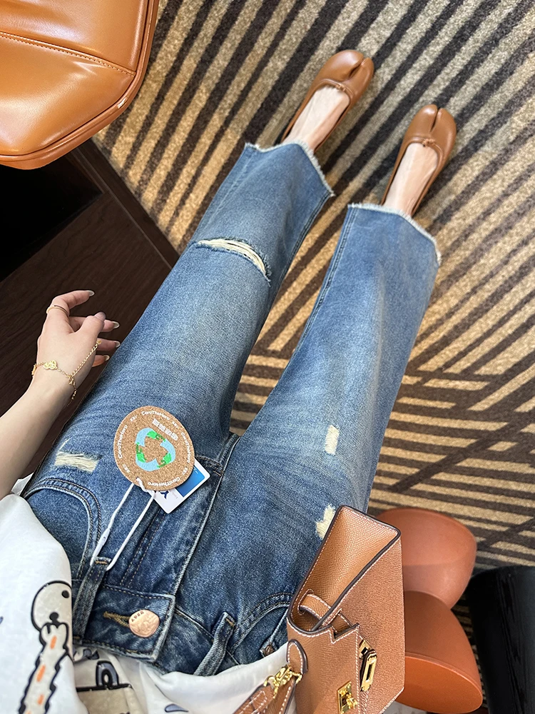 Женские джинсы с широкими штанинами, прямого кроя, с высокой талией, темно-синие, с эффектом потертости, с рваным краем, длиной 9/10, свободного кроя, модные джинсовые брюки
Женские джинсы с широкими штанинами, прямого кроя, с высокой талией, темно-синие, с эффектом потертости, с рваным краем, длиной 9/10, свободного кроя, модные джинсовые брюки