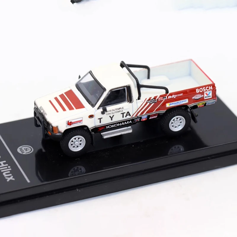 Para64 масштаб 1:64 1985 TYT Hilux's одиночная кабина из сплава, имитация модели автомобиля, статическая коллекция, украшенные праздничные игрушки, сувенирный подарок 
Para64 масштаб 1:64 1985 TYT Hilux's одиночная кабина из сплава, имитация модели автомобиля, статическая коллекция, украшенные праздничные игрушки, сувенирный подарок