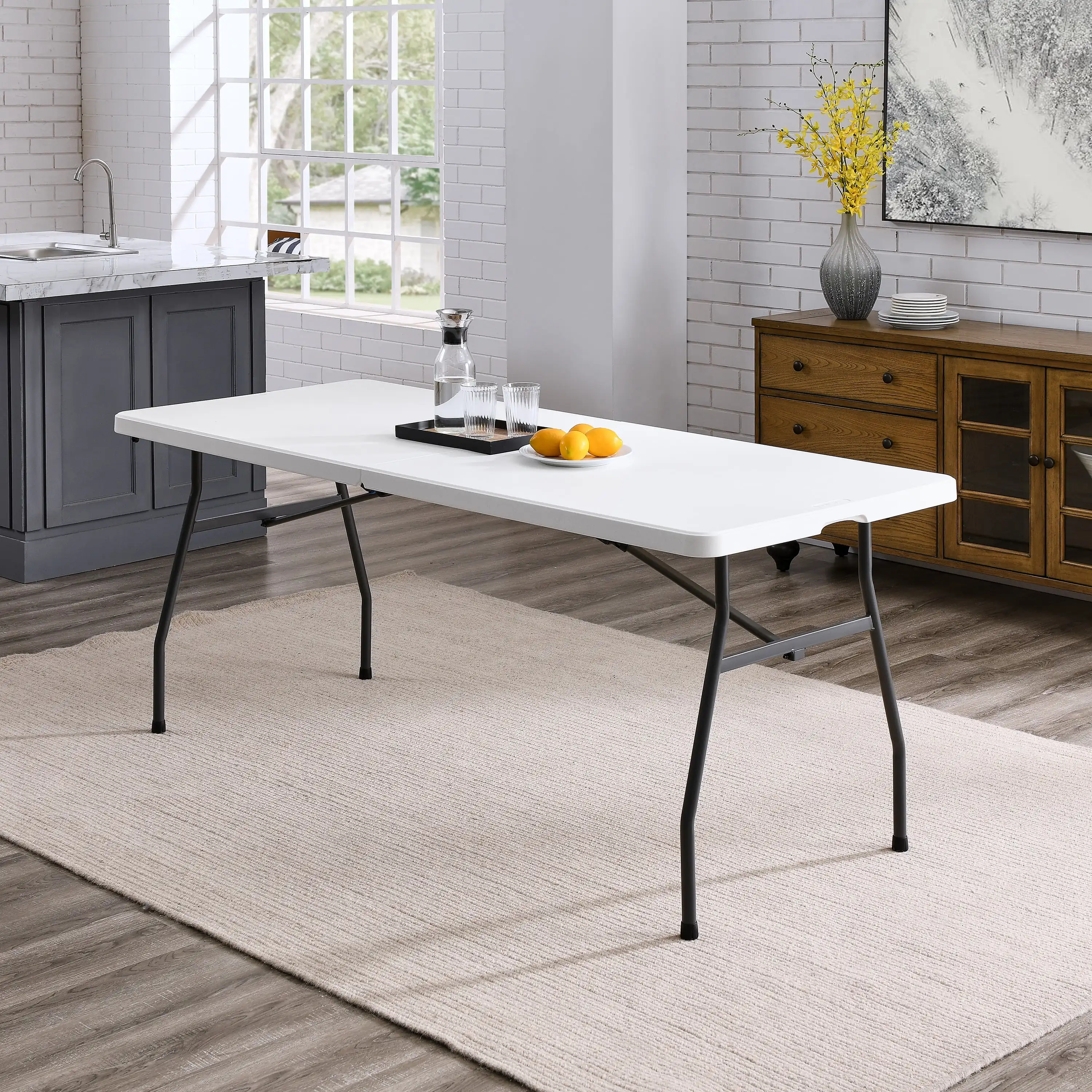 White 6 Foot Fold-in-Half Plastic Table, Indoor Outdoor, Scratch Resistant, Stain & UV Damage, Built-in Carry Handle
White 6 Foot Fold-in-Half Plastic Table, Indoor Outdoor, Scratch Resistant, Stain & UV Damage, Built-in Carry Handle