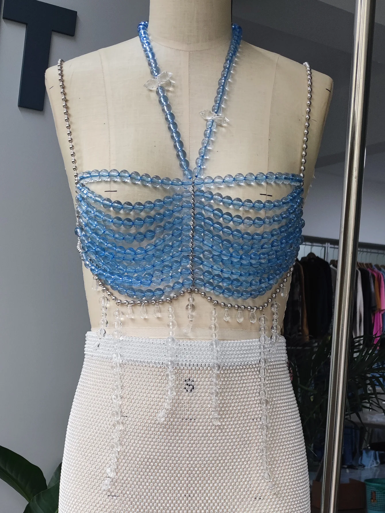 Transparent Hollow Blue dyed beads Backless Tassel Handmade Beaded Bra Top
Transparent Hollow Blue dyed beads Backless Tassel Handmade Beaded Bra Top