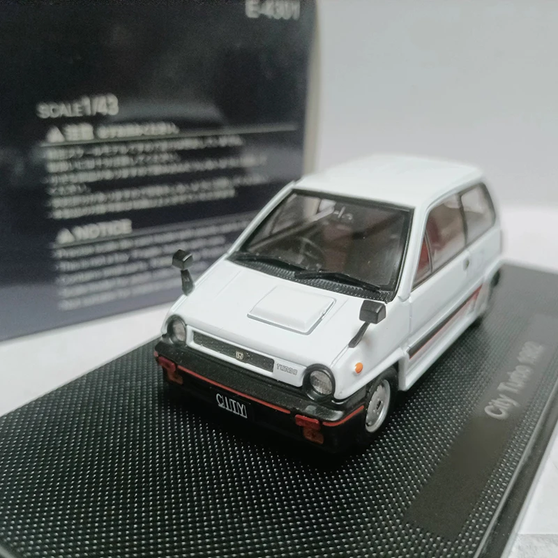 Ebbro масштаб 1/43 City Turbo 1982, имитация сплава, модель автомобиля, статическая коллекция, украшенные праздничные подарки, игрушки, сувенирный подарок
Ebbro масштаб 1/43 City Turbo 1982, имитация сплава, модель автомобиля, статическая коллекция, украшенные праздничные подарки, игрушки, сувенирный подарок