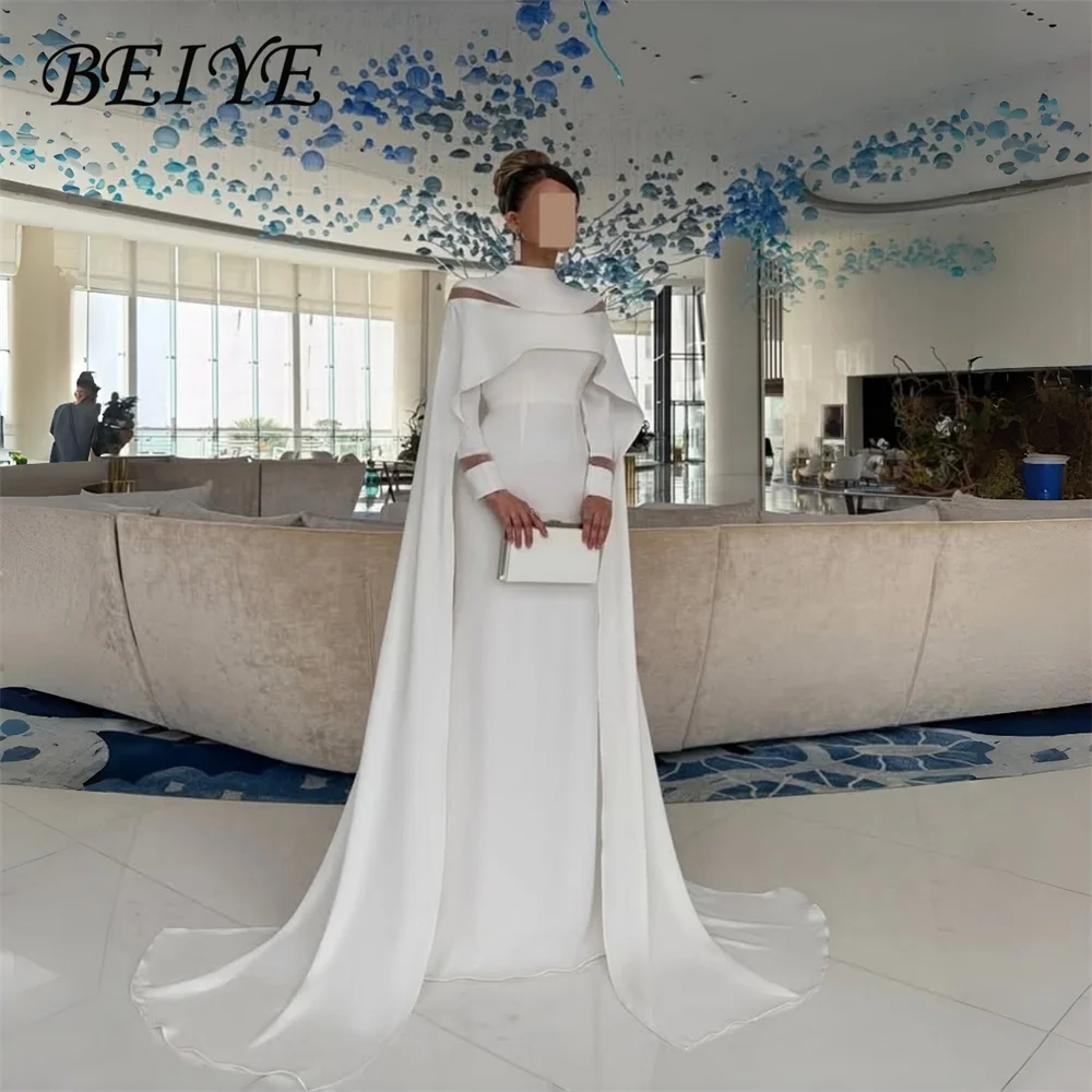 BEIYE Vintage Ivory Sheath Evening Dress With Cape 2026 High Collar Long Sleeves Prom Dress Floor Length Party Gowns Customized
BEIYE Vintage Ivory Sheath Evening Dress With Cape 2026 High Collar Long Sleeves Prom Dress Floor Length Party Gowns Customized