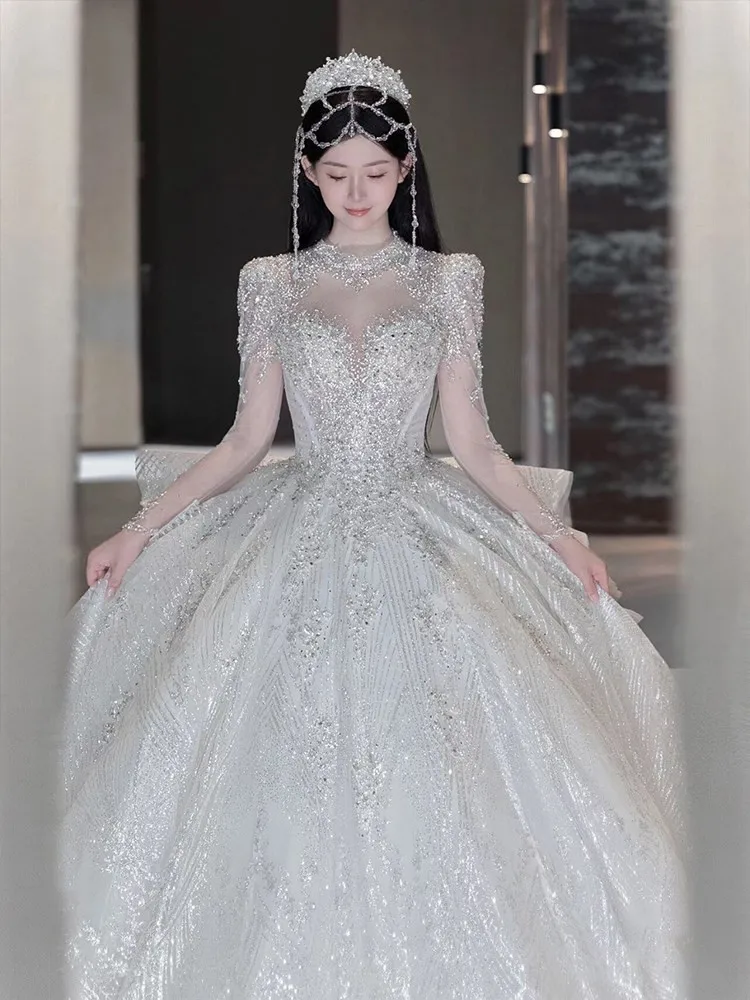 A new light luxury heavy-duty long-sleeved luxurious and main fabric long tailline dress
A new light luxury heavy-duty long-sleeved luxurious and main fabric long tailline dress