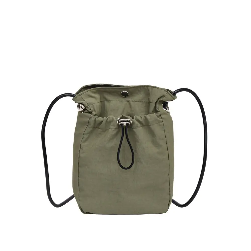 Sweet Korean Style Drawstring Canvas Bag Crossbody Bag Solid Color Nylon Shoulder Bag Purse Wallet Bags Mobile Phone Bag Girls
Sweet Korean Style Drawstring Canvas Bag Crossbody Bag Solid Color Nylon Shoulder Bag Purse Wallet Bags Mobile Phone Bag Girls