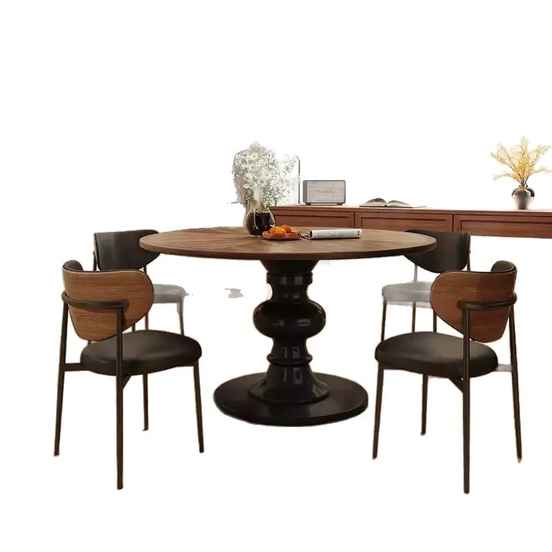 French medieval style high-end sense, round dining table walnut color small apartment, household black solid wood
French medieval style high-end sense, round dining table walnut color small apartment, household black solid wood