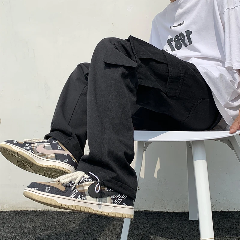 Trendy Korean Workwear Pants for Men Spring Autumn Loose Straight Casual Hong Kong Sle Pure Cotton Long Pants with Big kets
Trendy Korean Workwear Pants for Men Spring Autumn Loose Straight Casual Hong Kong Sle Pure Cotton Long Pants with Big kets