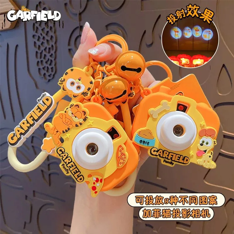 Official Garfield Projection Camera Keychain, Cute Cartoon Key Ring, Couple Car Bag Pendant, Creative Small Gift
Official Garfield Projection Camera Keychain, Cute Cartoon Key Ring, Couple Car Bag Pendant, Creative Small Gift