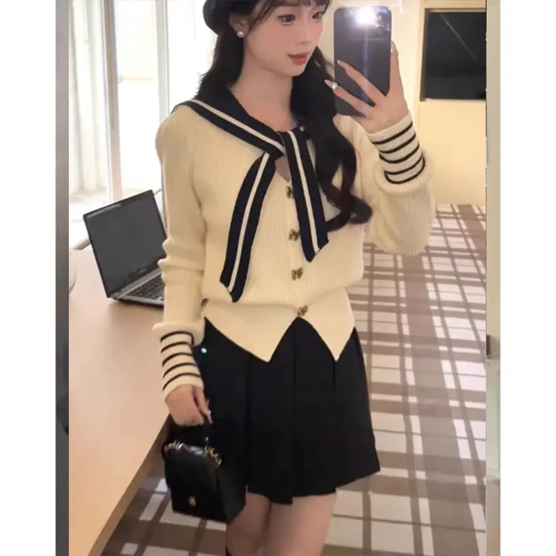 Autumn Winter Chic Bow Button V-neck Knitted Cardigan Women Clothing Vintage Simple Casual Sailor Collar Sweaters JJ283
Autumn Winter Chic Bow Button V-neck Knitted Cardigan Women Clothing Vintage Simple Casual Sailor Collar Sweaters JJ283