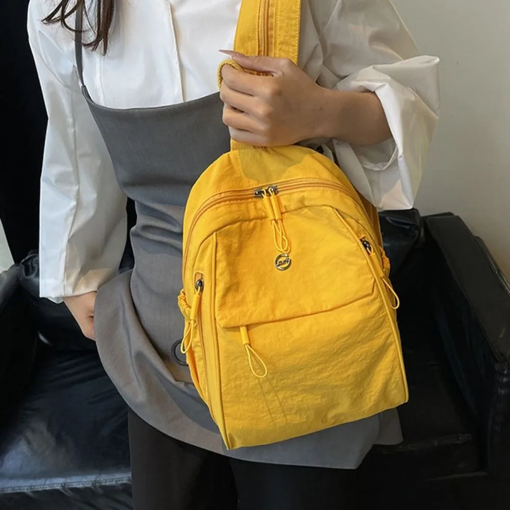 Solid Color Oxford Fabric Backpack Light Weight Large Capacity Casual Crossbody Bag Nylon Casual Lightweight Travel Backpack
Solid Color Oxford Fabric Backpack Light Weight Large Capacity Casual Crossbody Bag Nylon Casual Lightweight Travel Backpack