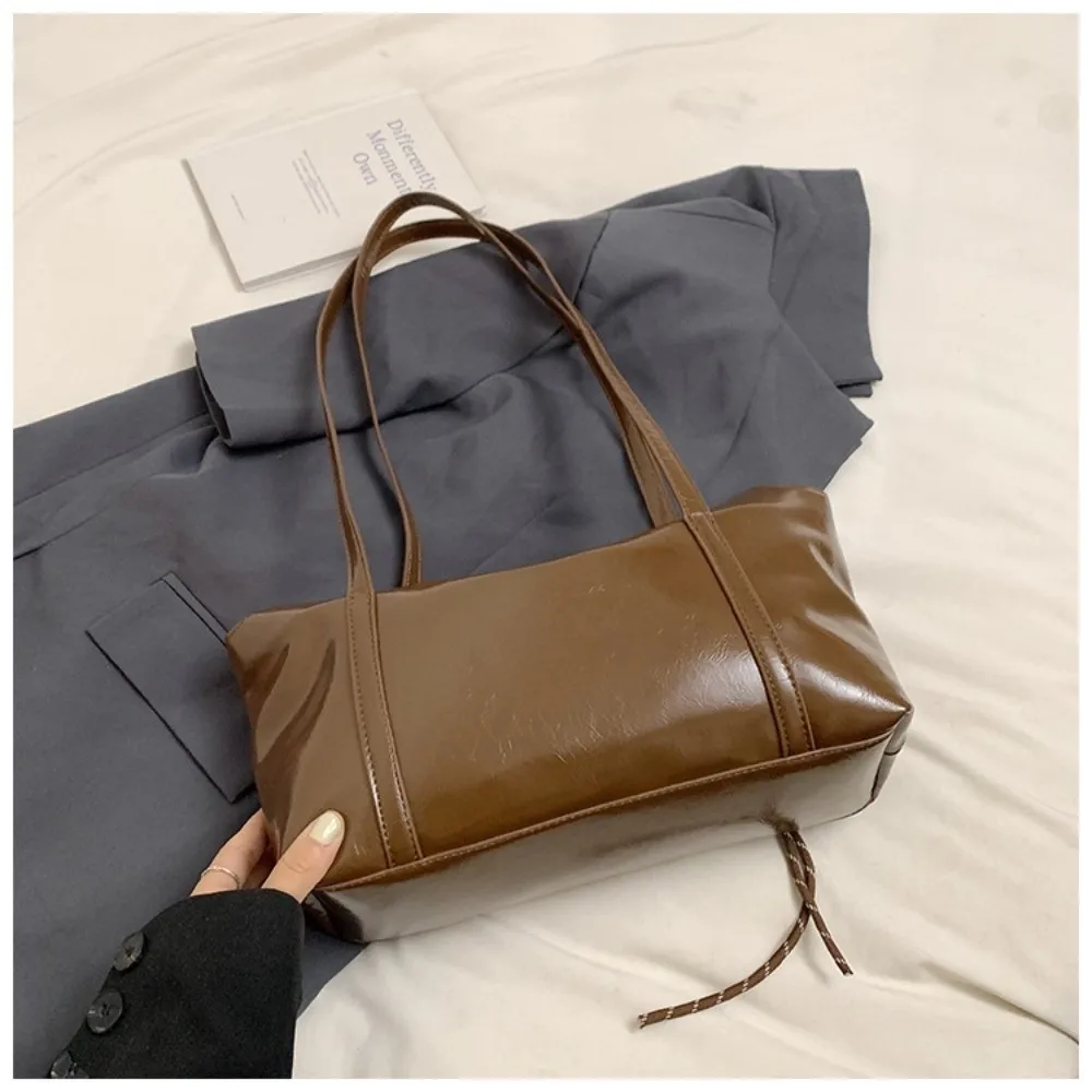 Korean Style Boston Pillow Bag with Pendant Minority Design Pu Dumpling Bag Solid Color Commuting Vintage Shoulder Bag Party
Korean Style Boston Pillow Bag with Pendant Minority Design Pu Dumpling Bag Solid Color Commuting Vintage Shoulder Bag Party
