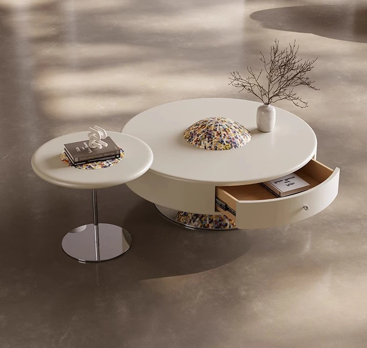 Creative cream wind round coffee table combination Italian minimalist small apartment living room
Creative cream wind round coffee table combination Italian minimalist small apartment living room