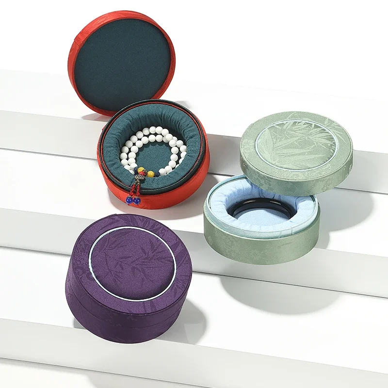 Circular cultural and jade bracelet box, sky and earth cover, jewelry packaging box, bracelet storage box
Circular cultural and jade bracelet box, sky and earth cover, jewelry packaging box, bracelet storage box