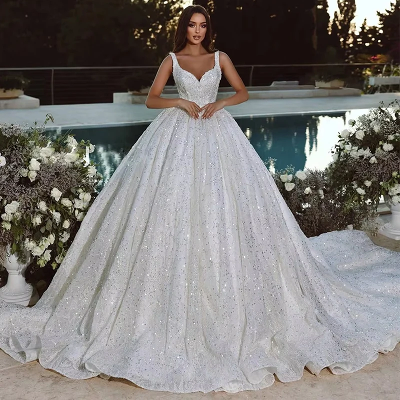 Elegant V-Neck Wedding Dress for Outdoor Weddings Sparkling Sequined Bridal Dress A-line Tulle Ball Gown Wedding Dress Customize
Elegant V-Neck Wedding Dress for Outdoor Weddings Sparkling Sequined Bridal Dress A-line Tulle Ball Gown Wedding Dress Customize