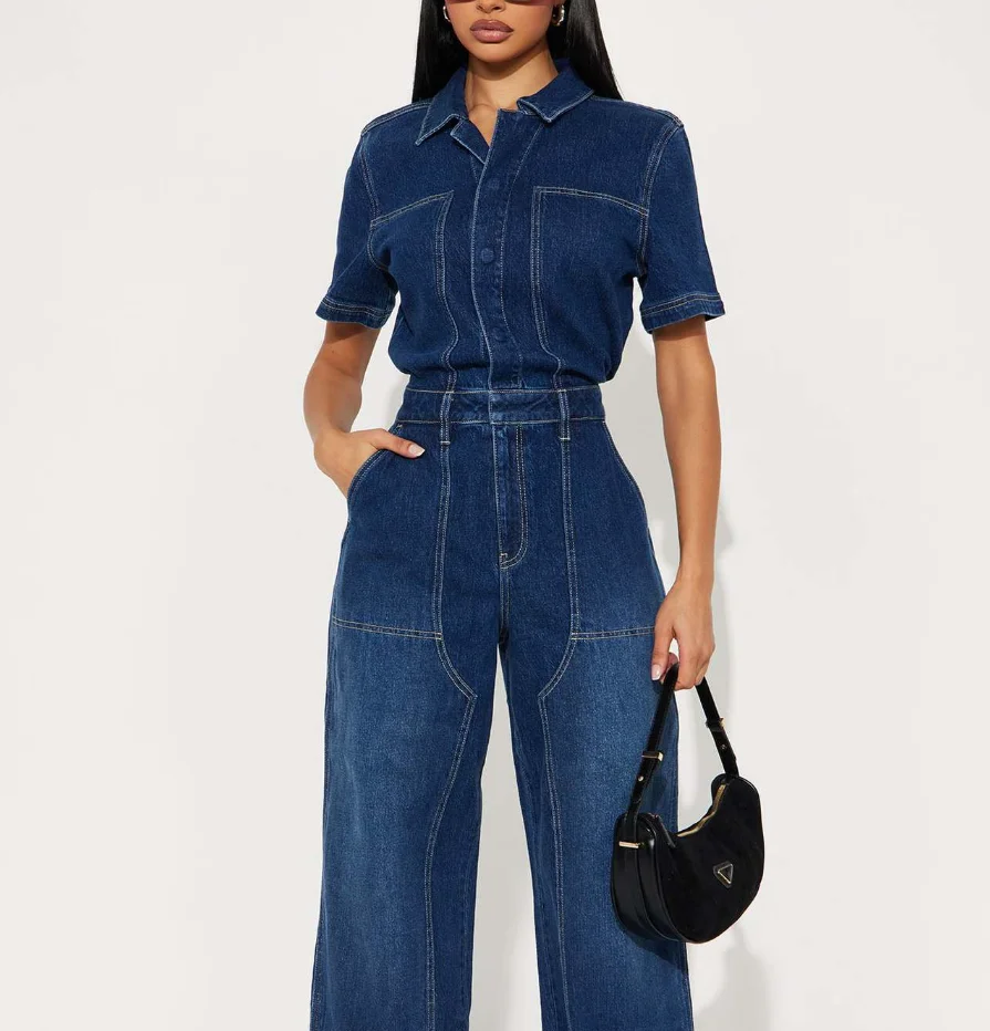 Summer New Fashion Trend High Street Style Dark Denim Fabric Lapel Button Front Waist Cinched Short Sleeved Denim Jumpsuit
Summer New Fashion Trend High Street Style Dark Denim Fabric Lapel Button Front Waist Cinched Short Sleeved Denim Jumpsuit