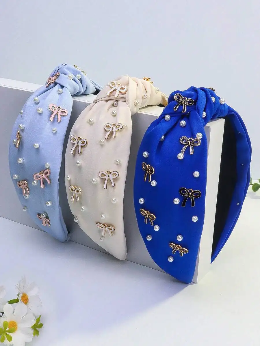 Women’s Wide Fabric Knot Headband In Solid Colors With Pearl And Metallic Bow Accents For Hair Styling
Women’s Wide Fabric Knot Headband In Solid Colors With Pearl And Metallic Bow Accents For Hair Styling