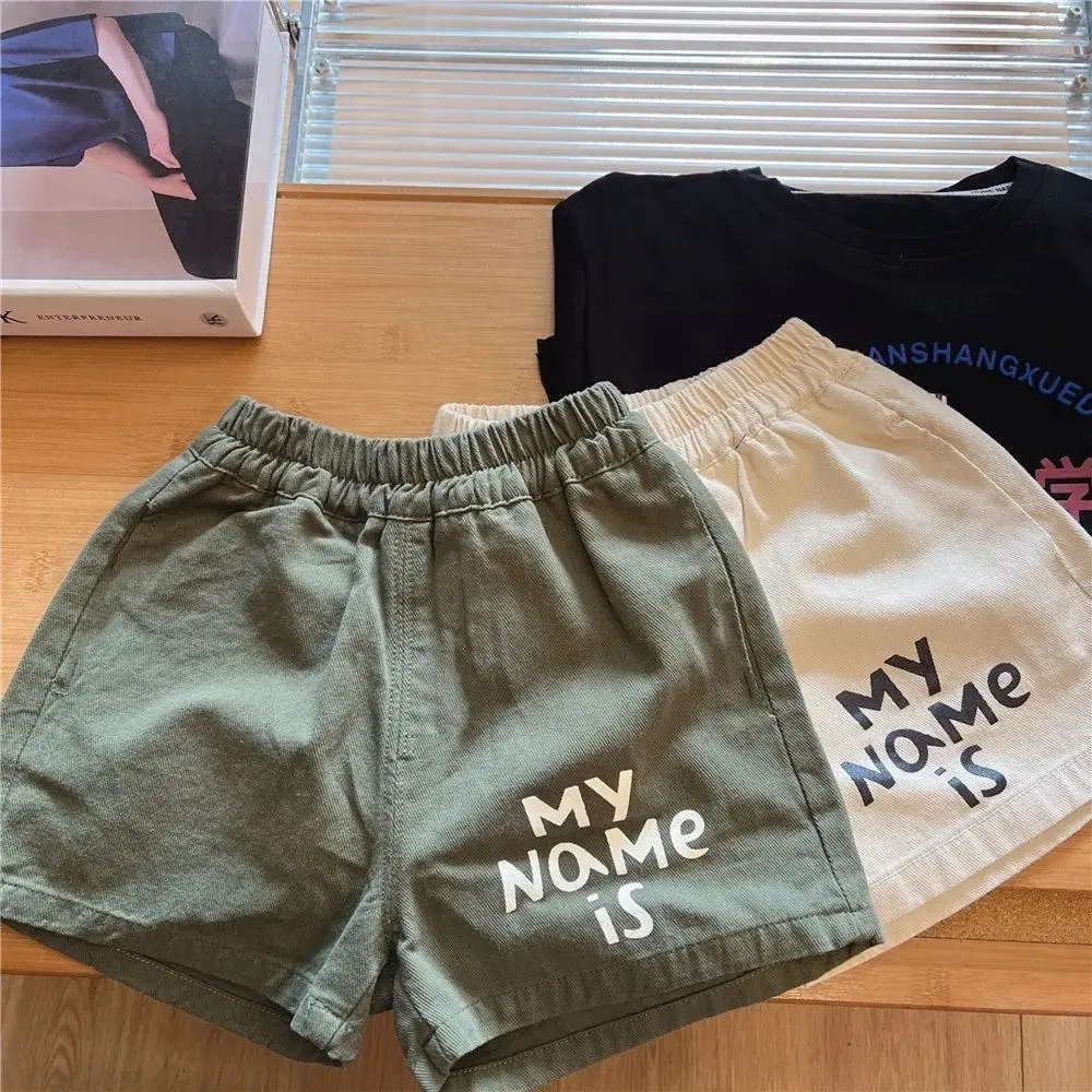Children's shorts thin Korean version loose letter pure cotton summer shorts for boys and girls
Children's shorts thin Korean version loose letter pure cotton summer shorts for boys and girls