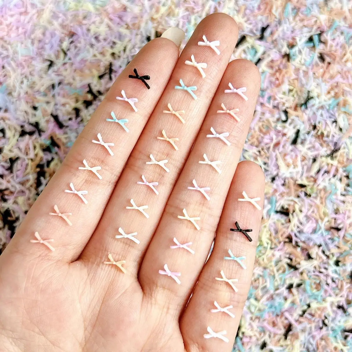 100PCS Creative Mini Line Bowknots Nail Charms New Quirky Colorful Bows Resin Nail Art Decorations for DIY Fairy Nails Supplies
100PCS Creative Mini Line Bowknots Nail Charms New Quirky Colorful Bows Resin Nail Art Decorations for DIY Fairy Nails Supplies