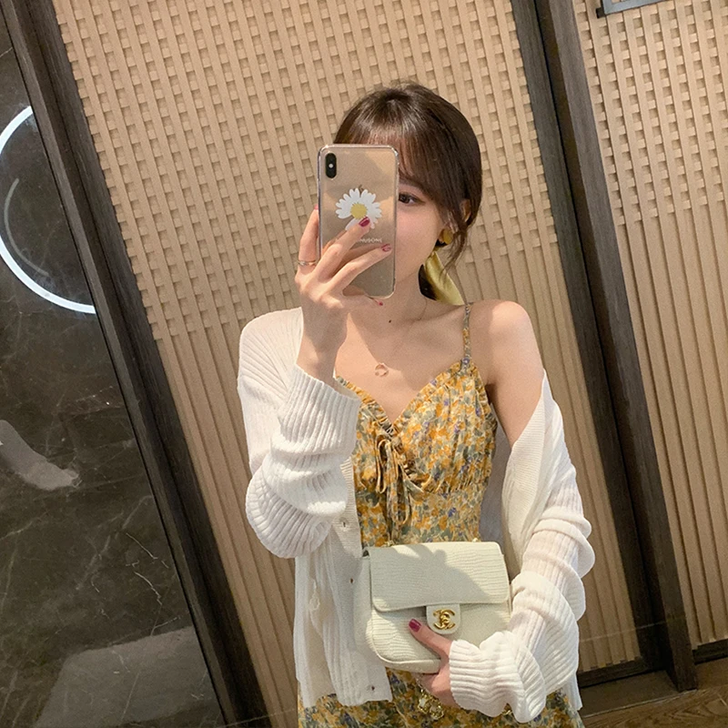 Women's Summer Long Sleeve Ice Silk Knitted Sun Protection Shirt White Versatile Short Outerwear Spring Autumn V-neck Button ...
Women's Summer Long Sleeve Ice Silk Knitted Sun Protection Shirt White Versatile Short Outerwear Spring Autumn V-neck Button ...
