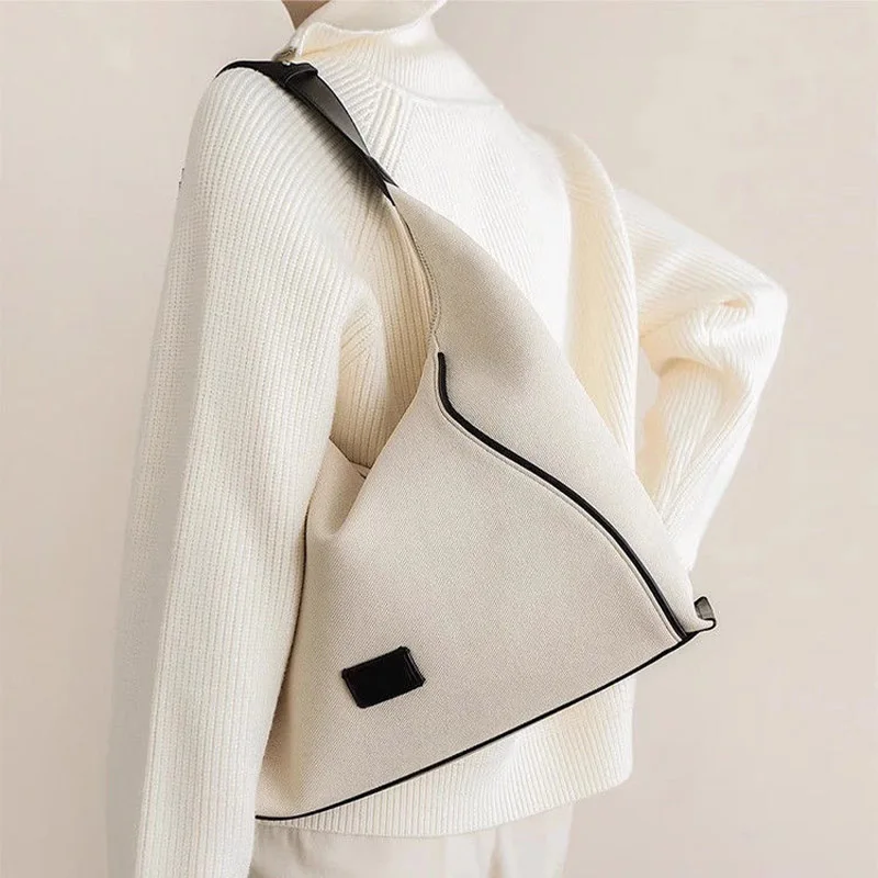 Весенне-летняя новая женская парусиновая сумка большой вместимости, новинка 2026, повседневная простая сумка-хобо на одно плечо, подмышками
Весенне-летняя новая женская парусиновая сумка большой вместимости, новинка 2026, повседневная простая сумка-хобо на одно плечо, подмышками