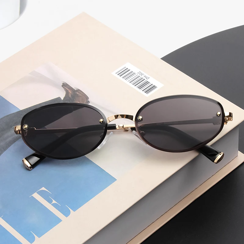 Small Oval Rimless Sunglasses Women Retro Metal Frame Cut Edge Photochromic Eyewear Fashion Trendy Sun Glasses for Street Photo
Small Oval Rimless Sunglasses Women Retro Metal Frame Cut Edge Photochromic Eyewear Fashion Trendy Sun Glasses for Street Photo