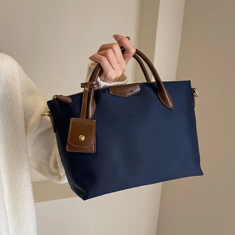 Однотонная сумка-тоут в стиле ретро, женская сумка-тоут из ткани Оксфорд, большая вместительная сумка на плечо, женская повседневная ручная сумка через плечо, новинка
Однотонная сумка-тоут в стиле ретро, женская сумка-тоут из ткани Оксфорд, большая вместительная сумка на плечо, женская повседневная ручная сумка через плечо, новинка