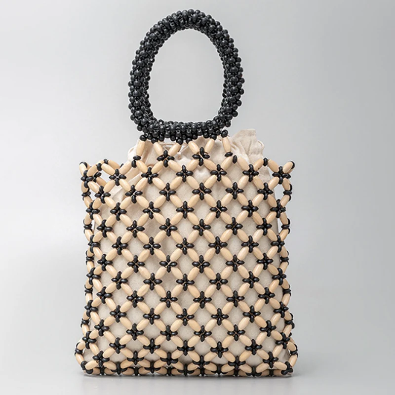 Large Capacity Wooden Bead Handbag Summer Beach Vacation Women's Bag Contrasting Colors Hollow Weaving Tote Bag
Large Capacity Wooden Bead Handbag Summer Beach Vacation Women's Bag Contrasting Colors Hollow Weaving Tote Bag