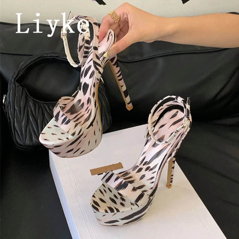 Liyke/летние босоножки на очень высоком каблуке 16 см, женские туфли-лодочки на платформе, модные женские туфли-лодочки с леопардовым принтом и пряжкой на ремешке, вечерние туфли для стриптиза 
Liyke/летние босоножки на очень высоком каблуке 16 см, женские туфли-лодочки на платформе, модные женские туфли-лодочки с леопардовым принтом и пряжкой на ремешке, вечерние туфли для стриптиза