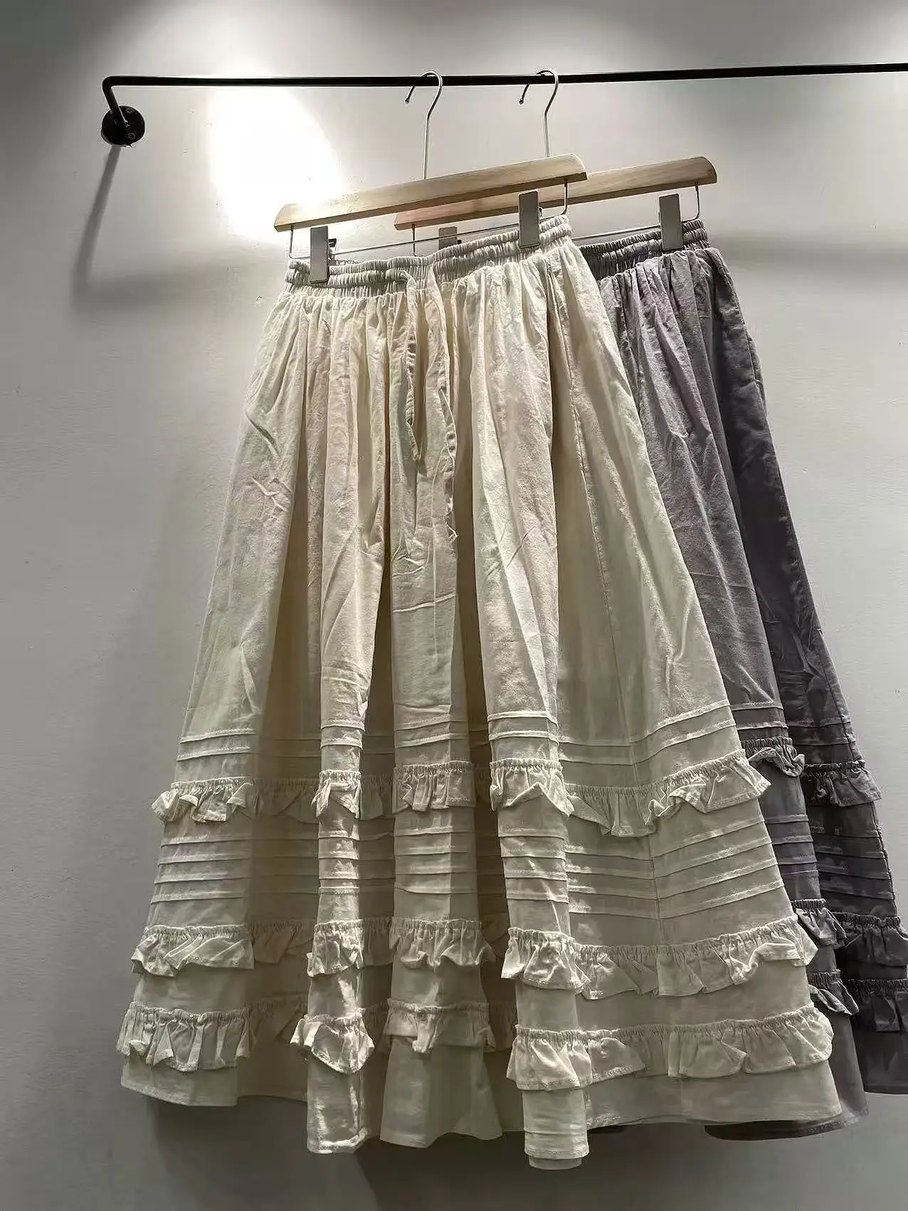 2026 Mori kei clothing spring Japanese style sweet elastic waist beige purple ruffled midi skirts pure cotton long boho skirts
2026 Mori kei clothing spring Japanese style sweet elastic waist beige purple ruffled midi skirts pure cotton long boho skirts