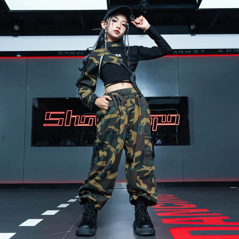 Танцевальный костюм для девочек, детская одежда в стиле хип-хоп, черный укороченный топ с галстуком и длинными рукавами, футболка с камуфляжным рукавом, повседневные брюки-карго для бега
Танцевальный костюм для девочек, детская одежда в стиле хип-хоп, черный укороченный топ с галстуком и длинными рукавами, футболка с камуфляжным рукавом, повседневные брюки-карго для бега