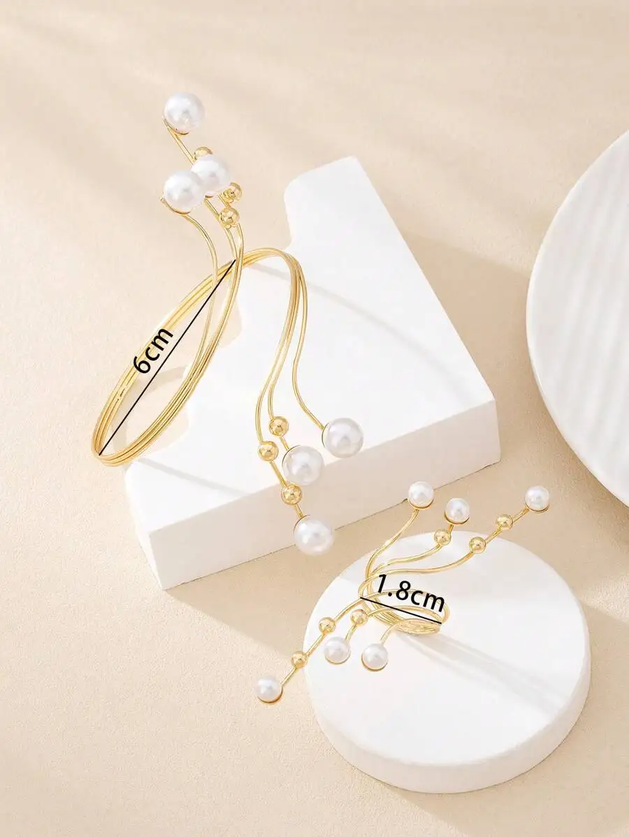 Gold-Tone Pearl Vine Style Adjustable Bracelet And Ring Set For Elegant Party Or Beach Occasion Wear
Gold-Tone Pearl Vine Style Adjustable Bracelet And Ring Set For Elegant Party Or Beach Occasion Wear