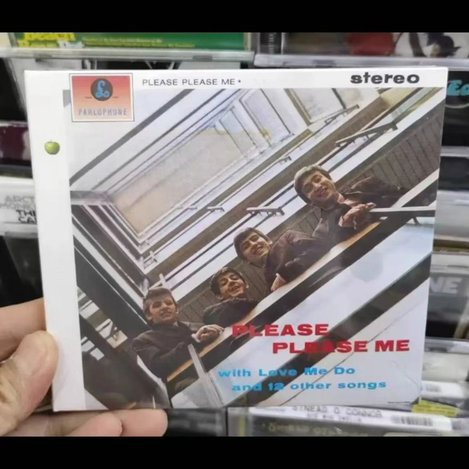"Please Please Me" British Rock Debut Album Music CD Vintage Stairwell Group Photo Cover Collectible Record
"Please Please Me" British Rock Debut Album Music CD Vintage Stairwell Group Photo Cover Collectible Record